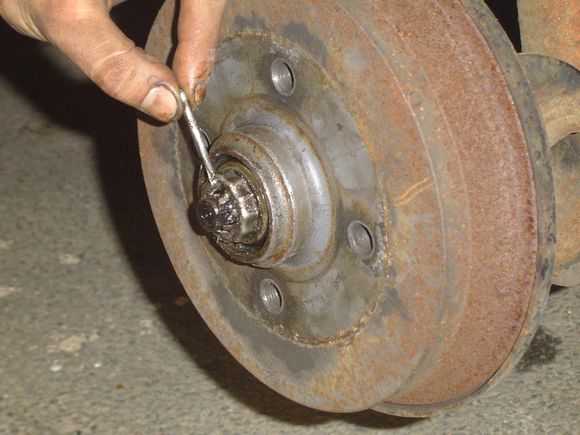 Remise en place de l'arrêt et de la goupille.
