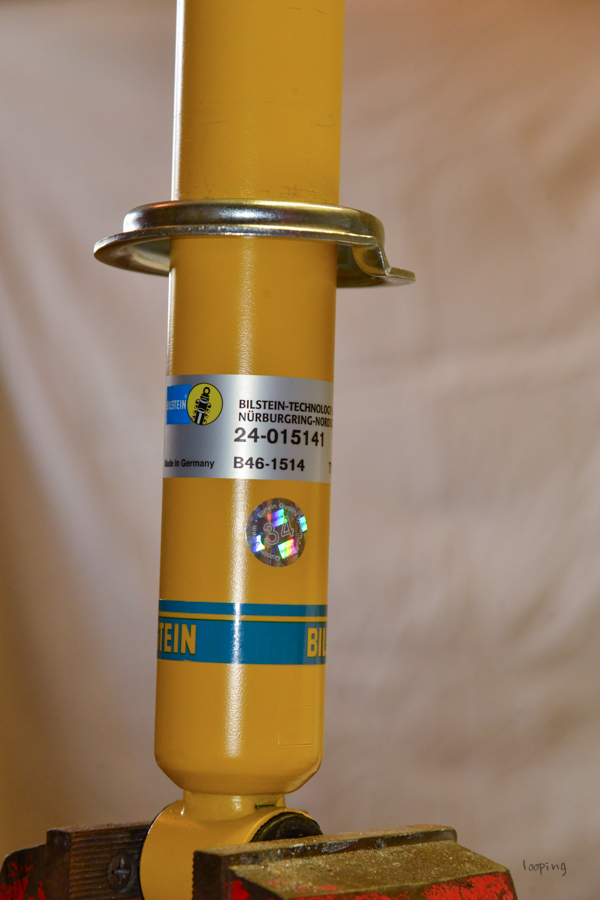 Mise en place de la coupelle inférieure du ressort